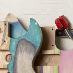 Designer Transforms old Skateboards into unique guitars and bass